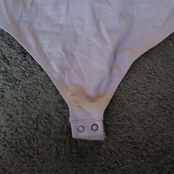 BRAND NEW WITH TAGS EXPRESS CUT OUT BODY SUIT MED - Picture 4 of 5